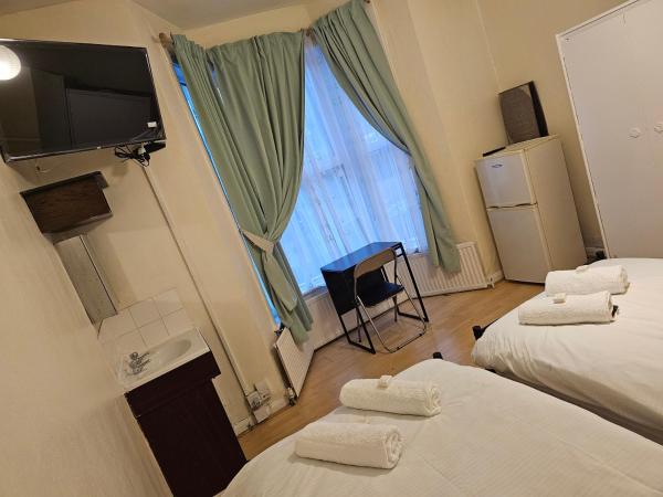 Bruce Rooms : photo 1 de la chambre chambre lits jumeaux