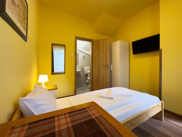 Írisz Panzió : photo 2 de la chambre chambre simple standard