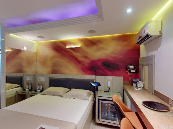 Motel DUBAI BH : photo 4 de la chambre suite avec baignoire spa