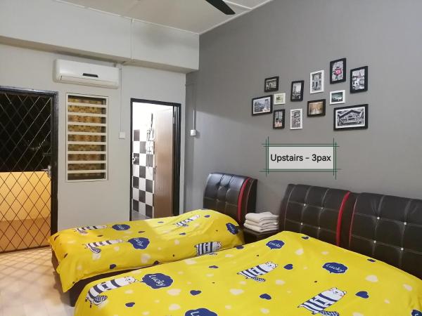 G East Ipoh Garden Guesthouse : photo 1 de la chambre chambre triple avec salle de bains