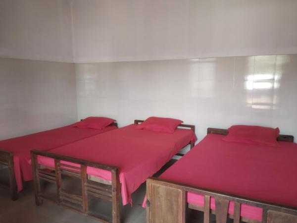 Sarigama Tourist Home : photo 5 de la chambre chambre familiale avec balcon