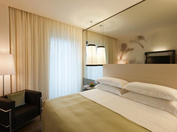 Starhotels Echo : photo 2 de la chambre chambre deluxe double ou lits jumeaux