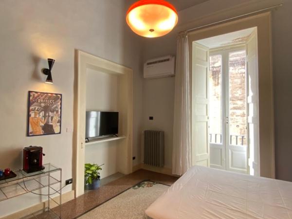 Roiss Haus Suites : photo 1 de la chambre suite avec balcon