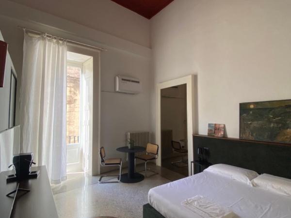 Roiss Haus Suites : photo 3 de la chambre suite lit king-size avec balcon
