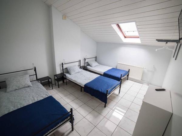 Pokoje Jaśminowa : photo 2 de la chambre chambre quadruple avec salle de bains commune