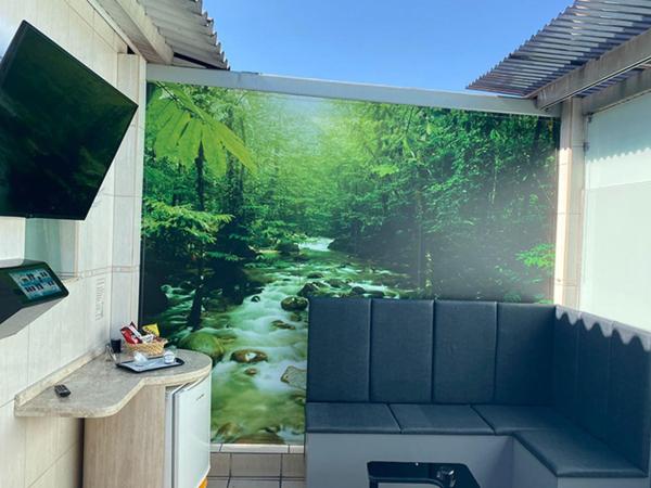 MOTEL 2000 : photo 3 de la chambre suite lit king-size avec baignoire spa