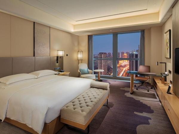 Doubletree By Hilton Chengdu Longquanyi : photo 1 de la chambre chambre lit king-size deluxe - Étage