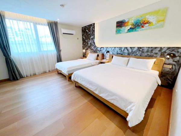 The Borneo Hotel : photo 1 de la chambre chambre triple deluxe