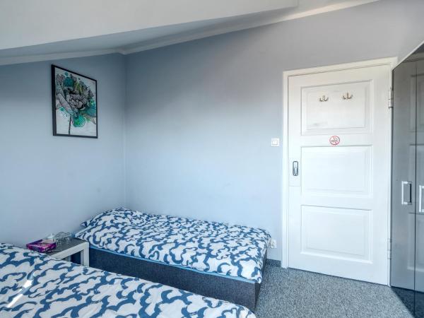 Noclegi pokoje gościnne Żeglarz : photo 2 de la chambre chambre quadruple