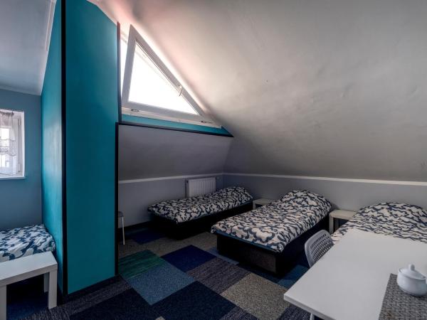 Noclegi pokoje gościnne Żeglarz : photo 3 de la chambre chambre quadruple