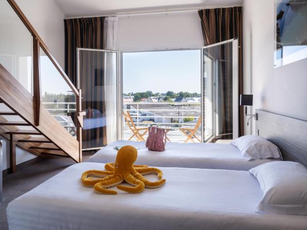 Golden Tulip La Baule : photo 3 de la chambre suite familiale