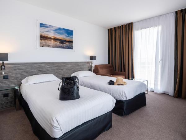 Golden Tulip La Baule : photo 3 de la chambre 2 chambres doubles communicantes