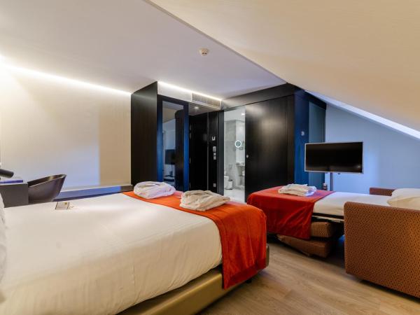 Hotel Santa Justa : photo 5 de la chambre chambre supérieure - vue sur rue