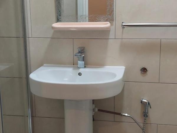 RK Heritage Hotel : photo 3 de la chambre chambre triple avec salle de bains privative