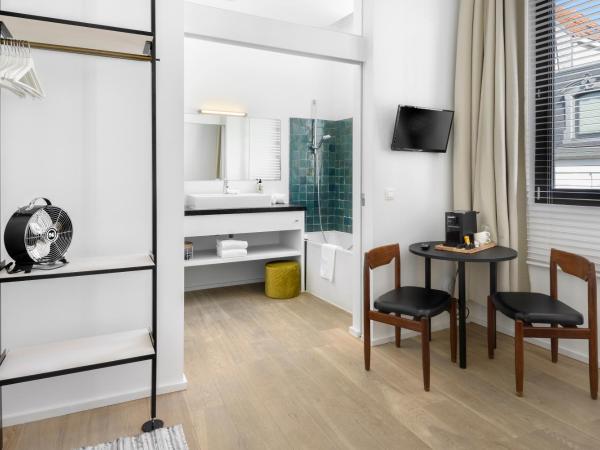 The 1880 Residence by Domani Hotels : photo 7 de la chambre chambre double deluxe avec baignoire