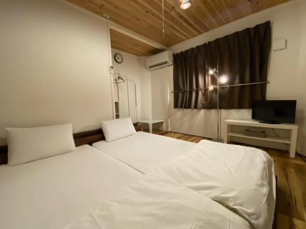 コインズホステル天神ペット宿泊可 : photo 2 de la chambre chambre lits jumeaux supérieure