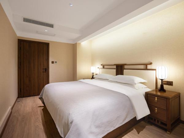 Honglu Garden Hotel Xi'an Bell and Drum Tower Huimin Street Store : photo 4 de la chambre yuechang'an · warm two bedroom family room