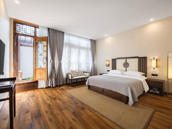 Honglu Garden Hotel Xi'an Bell and Drum Tower Huimin Street Store : photo 1 de la chambre chang'an residence · city wall panoramic garden suite