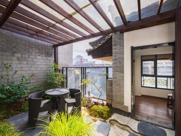 Honglu Garden Hotel Xi'an Bell and Drum Tower Huimin Street Store : photo 8 de la chambre chang'an residence · city wall panoramic garden suite