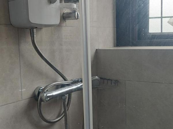 RK Heritage Hotel : photo 2 de la chambre chambre triple avec salle de bains privative