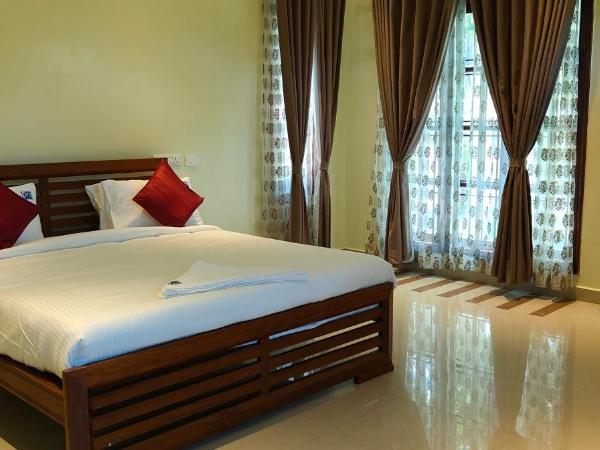 Seagull's Nest Beach House - Unit of Prohotel : photo 3 de la chambre chambre lit king-size avec balcon