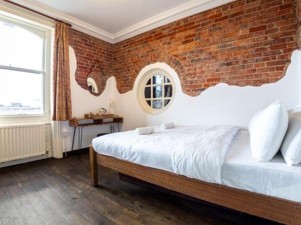 Palmers Lodge Swiss Cottage : photo 1 de la chambre chambre double privée avec salle de bains privative