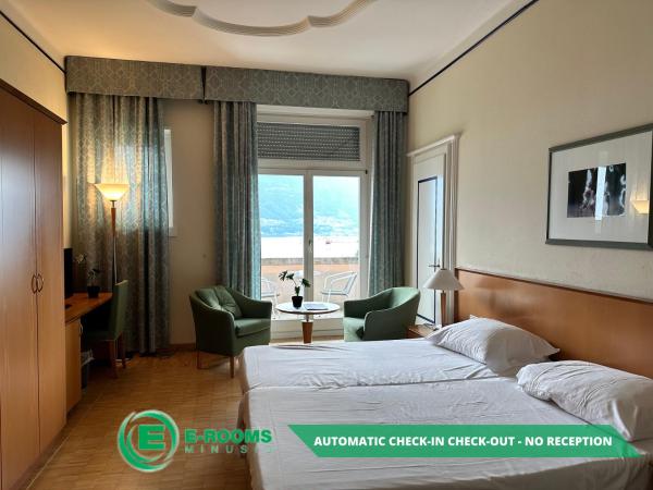 E-Rooms Minusio : photo 1 de la chambre chambre lits jumeaux - vue sur lac