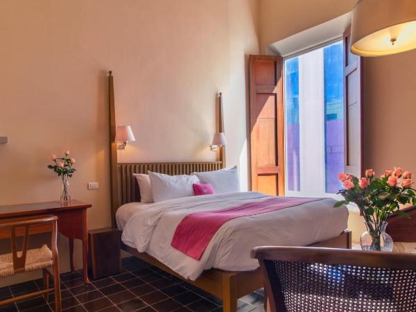 Rosas & Xocolate Boutique Hotel and Spa Merida, a Member of Design Hotels : photo 1 de la chambre chambre triple