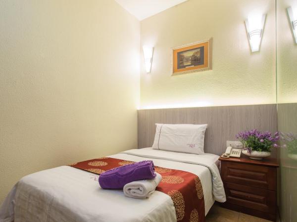 Lavender Inn Permas Jaya : photo 1 de la chambre chambre simple