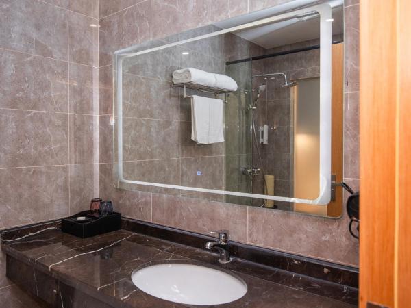 Future Shangju Hotel : photo 4 de la chambre chambre double ou lits jumeaux