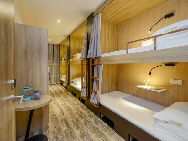 Heye International Youth Hostel : photo 1 de la chambre bed in 6-bed female dormitory room shared bathroom