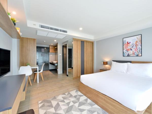 Raweewan Residence hotel : photo 3 de la chambre chambre lit queen-size - vue sur jardin