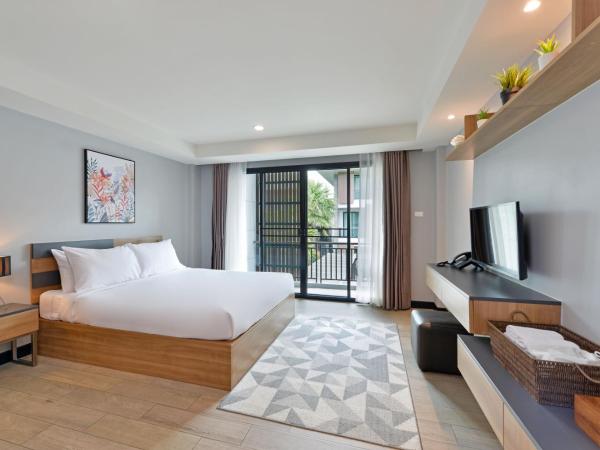 Raweewan Residence hotel : photo 2 de la chambre chambre lit queen-size - vue sur jardin