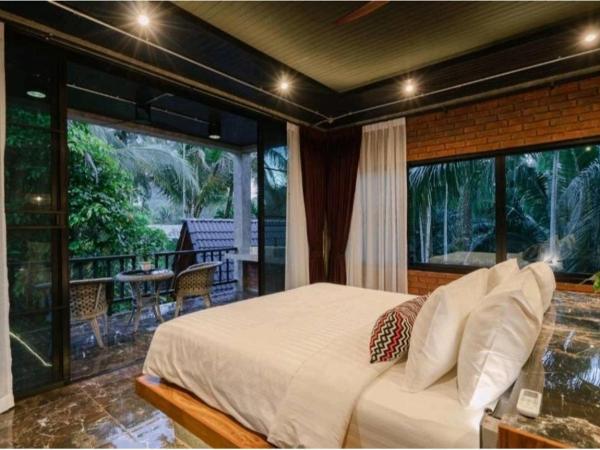 Grandfather Khaolak Resort : photo 3 de la chambre suite lit king-size