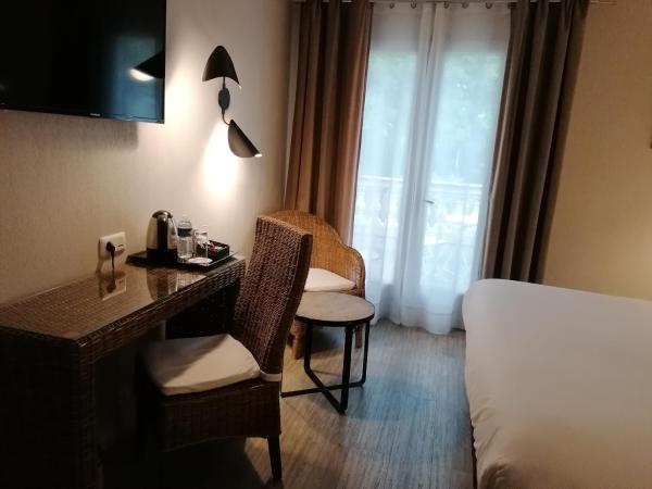 Best Western L'Orangerie : photo 4 de la chambre chambre lit queen-size supérieure - vue sur piscine