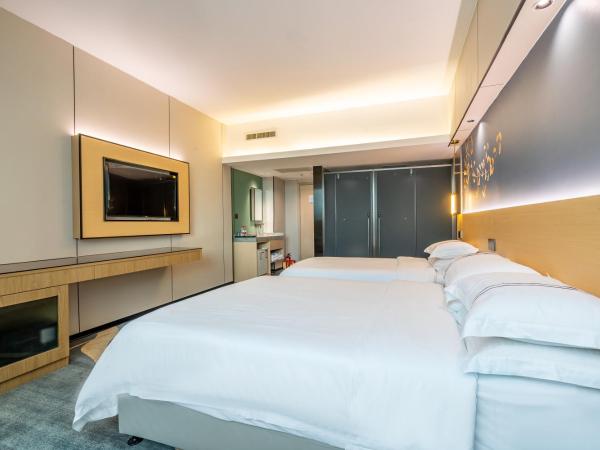 WAIFIDEN Hotel -Former Tokai Hotel - Xiaobei Metro Station - Free shuttle bus during Canton Fair : photo 6 de la chambre chambre lits jumeaux supérieure
