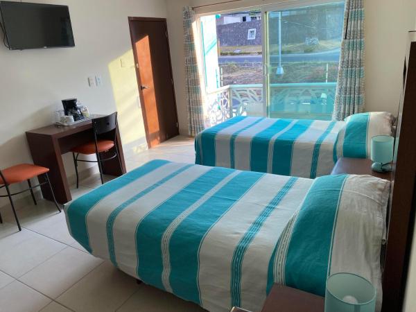 CORDIALITY INN : photo 1 de la chambre chambre lits jumeaux spacieuse