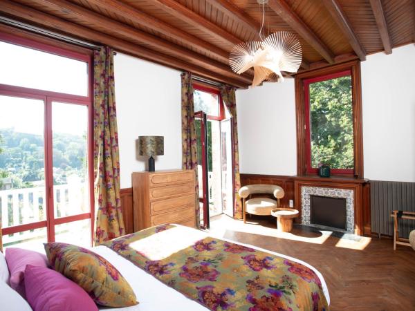 Villa Eliane - parking privé : photo 1 de la chambre chambre double deluxe avec balcon