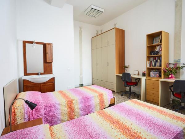 Ostello AMDG : photo 2 de la chambre lit simple dans dortoir pour hommes