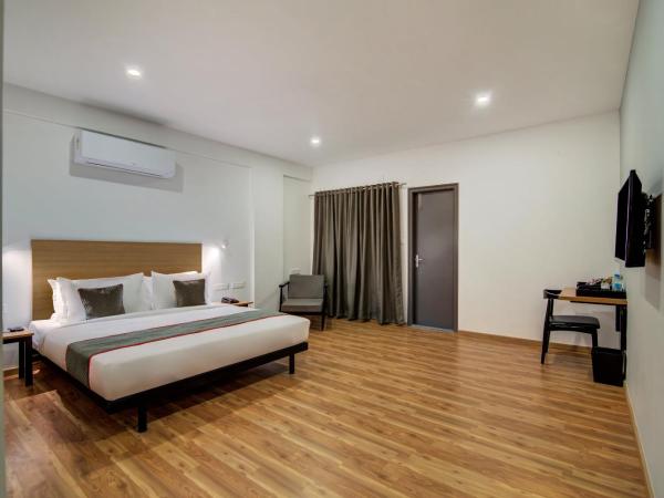 Townhouse 078 DODDA BANASWADI : photo 6 de la chambre chambre triple classique