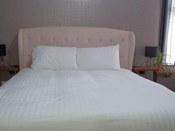 Vinnie's Family Hotel : photo 2 de la chambre suite familiale