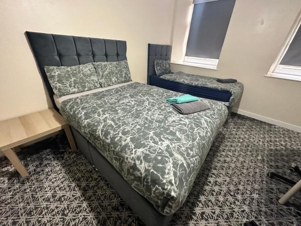 Rangers GuestHouse : photo 4 de la chambre chambre lits jumeaux avec douche