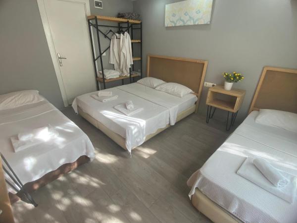 Gızlıkoyhotel : photo 2 de la chambre chambre quadruple standard