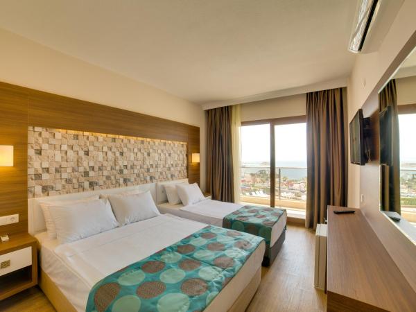 Comfort Ada Class Hotel : photo 1 de la chambre chambre double ou lits jumeaux - vue sur mer