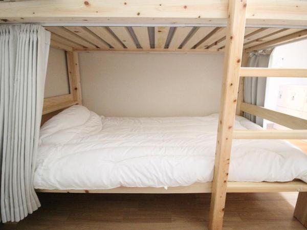 Glocal Nagoya Backpackers Hostel : photo 3 de la chambre lit dans dortoir pour femmes de 4 lits