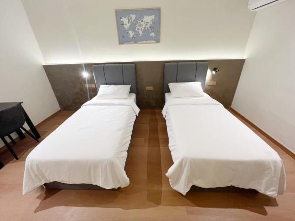 The Borneo Hotel : photo 4 de la chambre chambre lits jumeaux supérieure (sans fenêtre)