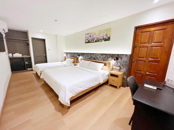 The Borneo Hotel : photo 3 de la chambre chambre triple supérieure (sans fenêtre)