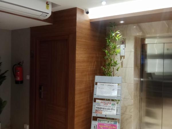 Grand Courtyard Business Hotel : photo 7 de la chambre chambre double ou lits jumeaux avec salle de bains