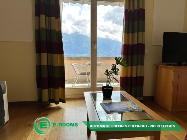 E-Rooms Minusio : photo 5 de la chambre chambre quadruple - vue sur lac