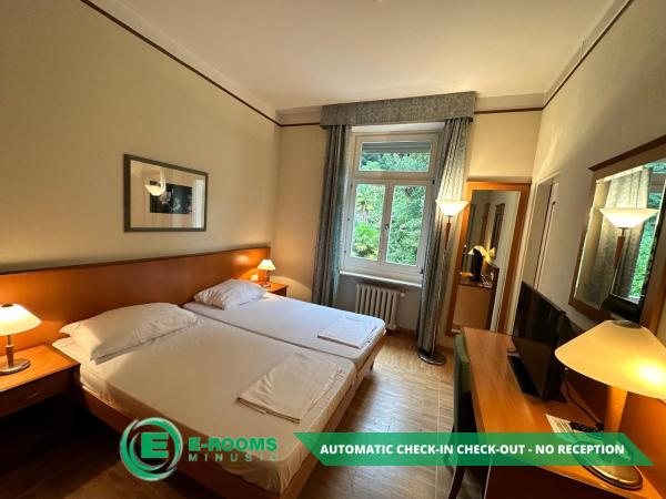 E-Rooms Minusio : photo 2 de la chambre chambre lits jumeaux